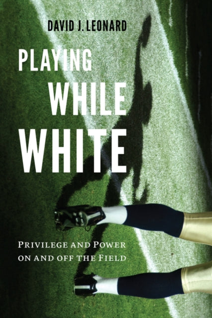 Book cover of: Playing While White. By: David J. Leonard