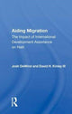 Book cover of: Aiding Migration
