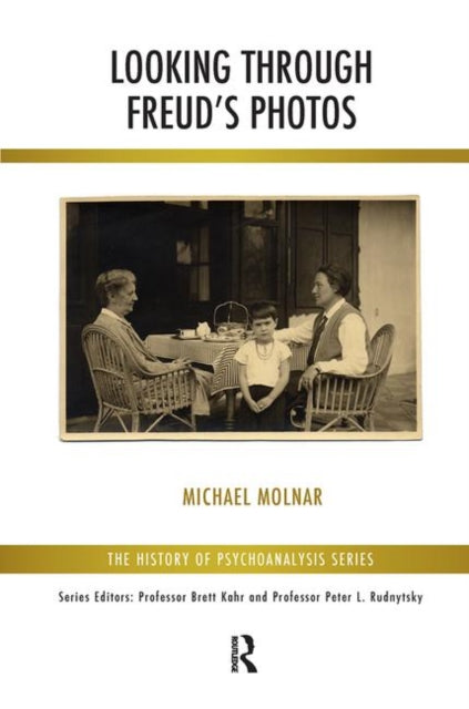 Book cover of: Looking Through Freud's Photos. By: Michael Molnar