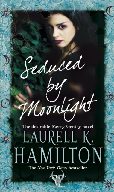 Book cover of: Seduced By Moonlight. By: Laurell K. Hamilton