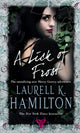 Book cover of: Lick Of Frost. By: Laurell K. Hamilton