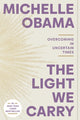 Book cover of: Light We Carry. By: Crown