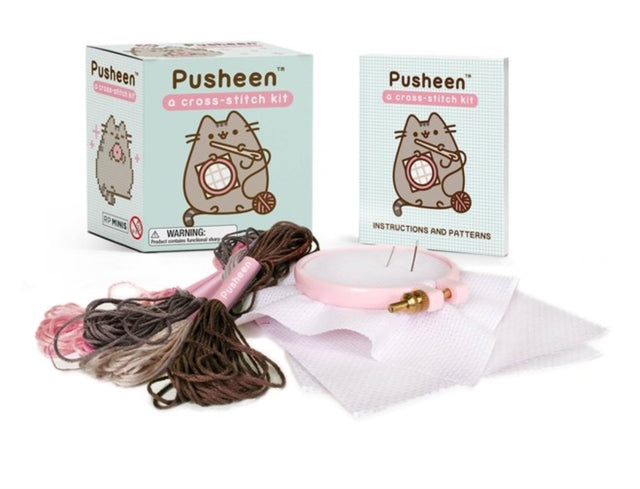 Book cover of: Pusheen: A Cross-Stitch Kit. By: Claire Belton