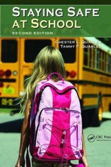 Book cover of: Staying Safe at School. By: Chester L. Quarles