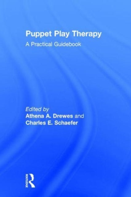 Book cover of: Puppet Play Therapy. By: Athena A. Drewes