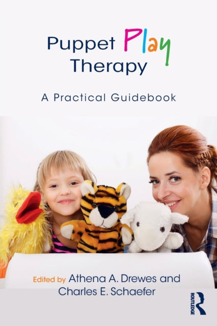 Book cover of: Puppet Play Therapy. By: Athena A. Drewes