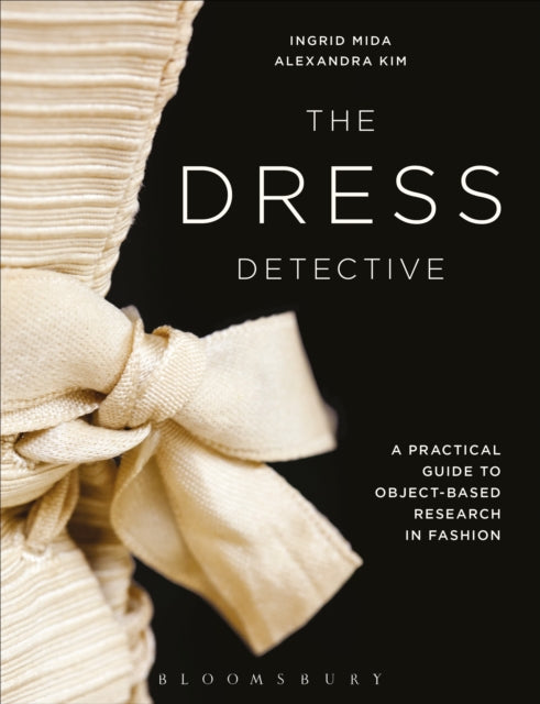 Book cover of: Dress Detective. By: Ingrid E. Mida