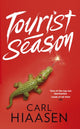 Book cover of: Tourist Season. By: Carl Hiaasen