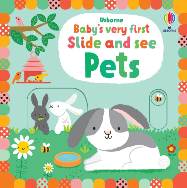 Book cover of: Baby's Very First Slide and See Pets. By: Fiona Watt