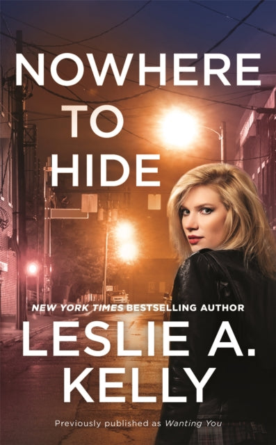 Book cover of: Nowhere to Hide (previously published as Wanting You). By: Leslie A. Kelly