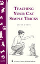 Book cover of: Teaching Your Cat Simple Tricks. By: Arden Moore