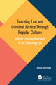 Book cover of: Teaching Law and Criminal Justice Through Popular Culture. By: Julian Hermida