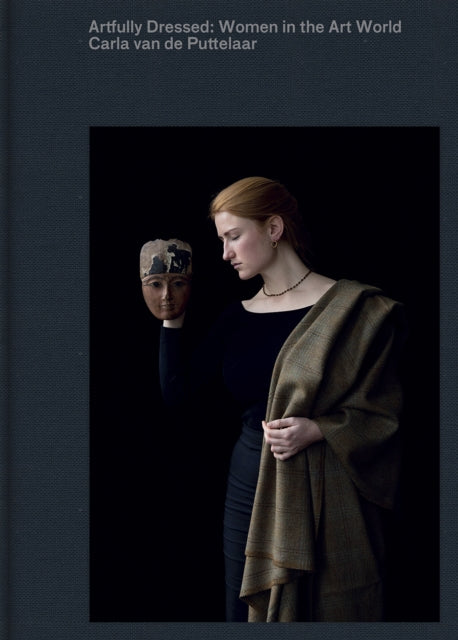 Book cover of: Artfully Dressed: Women in the Art World. By: de Puttelaar C. van