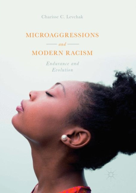 Book cover of: Microaggressions and Modern Racism. By: Charisse C. Levchak