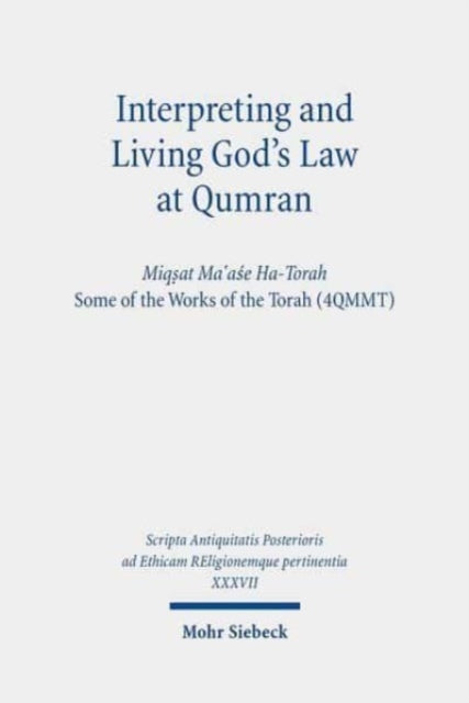 Book cover of: Interpreting and Living God's Law at Qumran. By: Reinhard Gregor Kratz