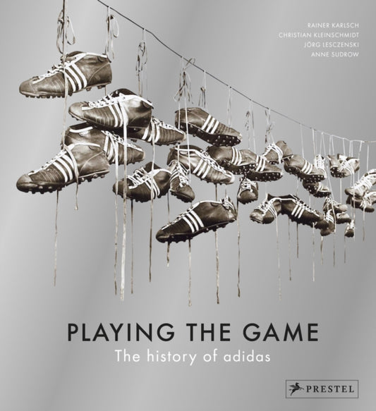 Book cover of: Playing the Game: The History of Adidas. By: Rainer Karlsch