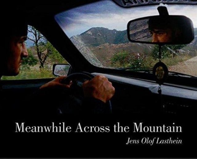 Book cover of: Meanwhile Across the Mountain. By: Jens Olof Lasthein